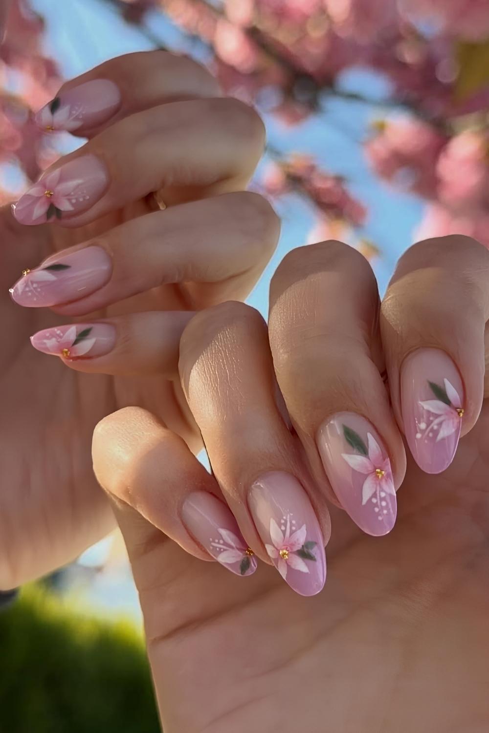 Flieder Ombre Naegel mit Sakura Design