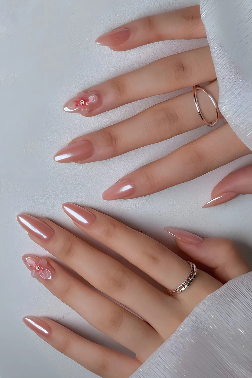 Pink Chrome Maniküre mit 3D-Blüten-Akzenten