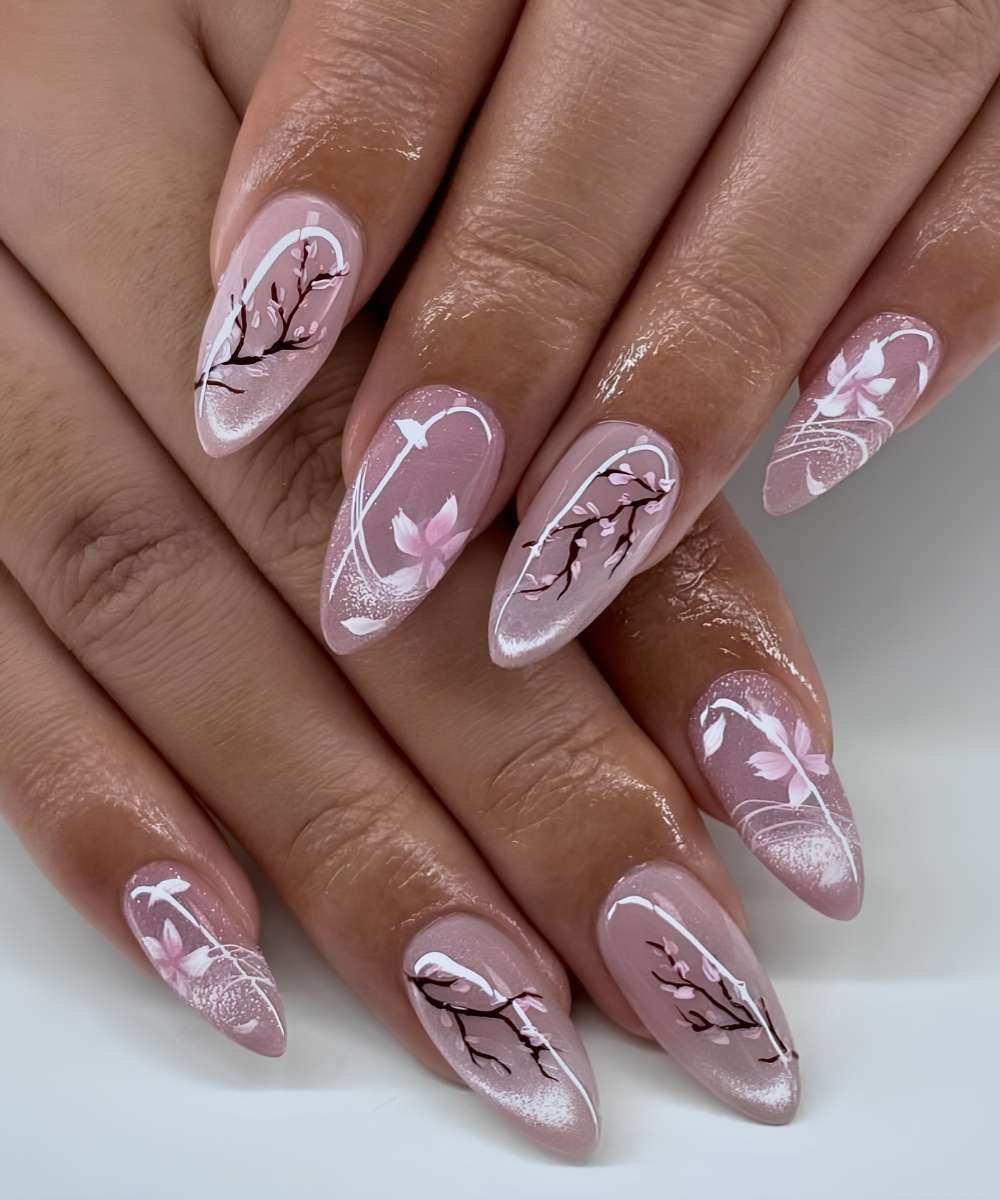 Rosa Cat Eye Naegel mit Kirschblueten Details