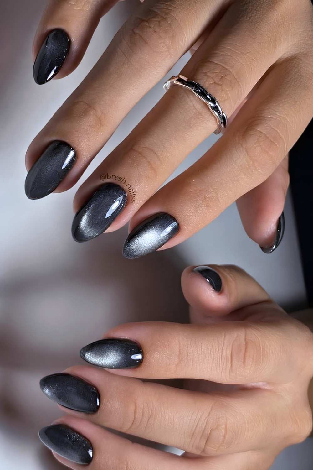 Schwarze Cat Eye Manikuere