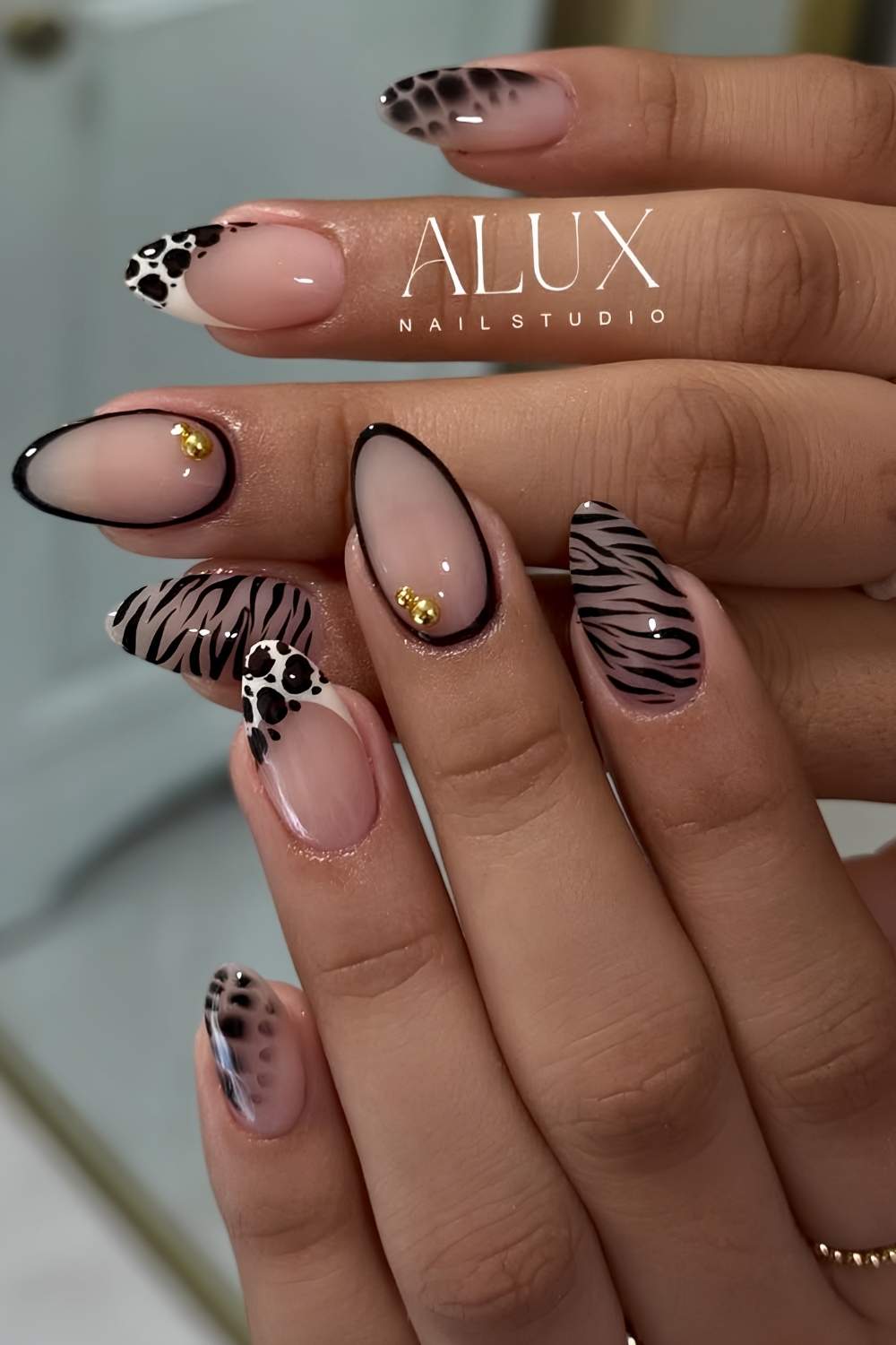 Schwarze Fruehlingsnaegel mit Animal Print