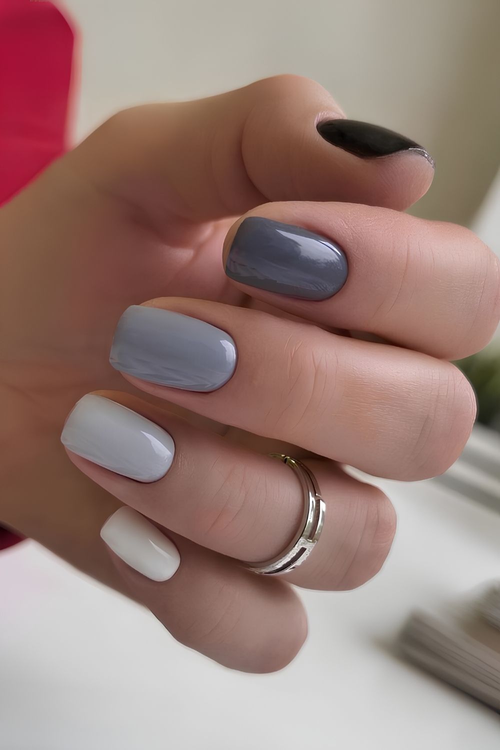 Skittle-Nägel in verschiedenen Grautönen