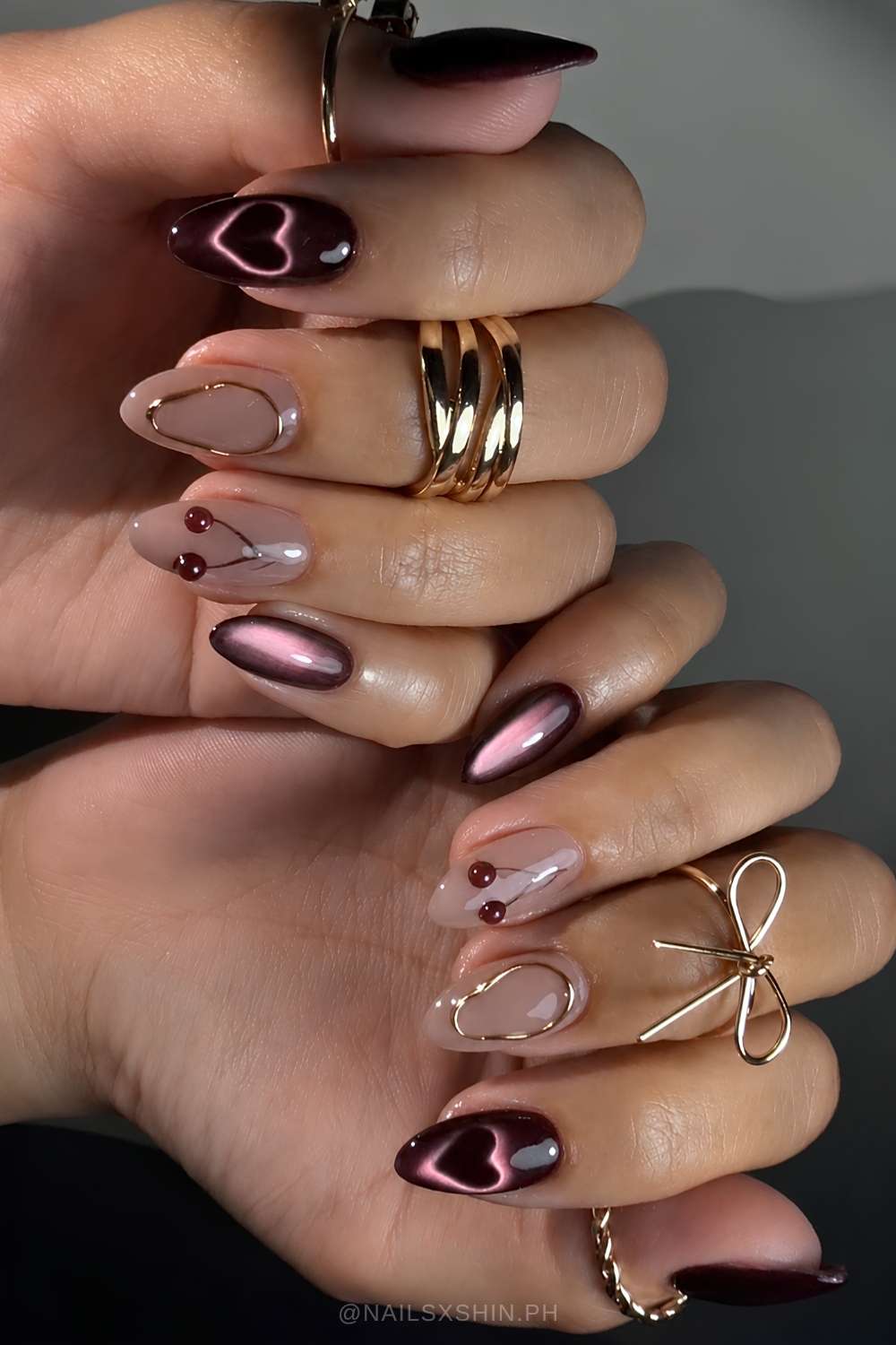 Dunkel Lila Cat Eye Naegel mit Herzen und Kirschen