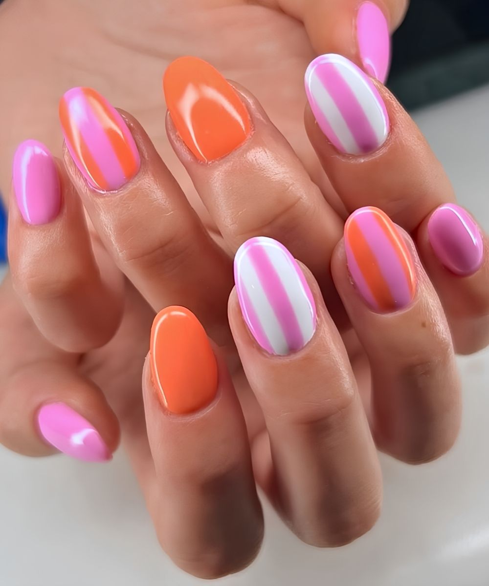 Orange pinke Streifennaegel