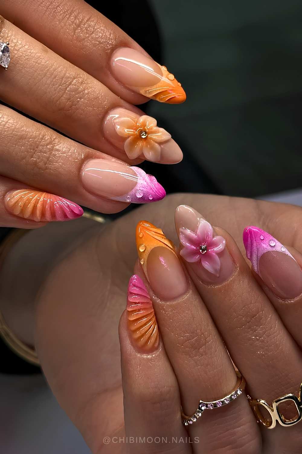 Rosa Orange Naegel mit 3D Swirls und Blumen