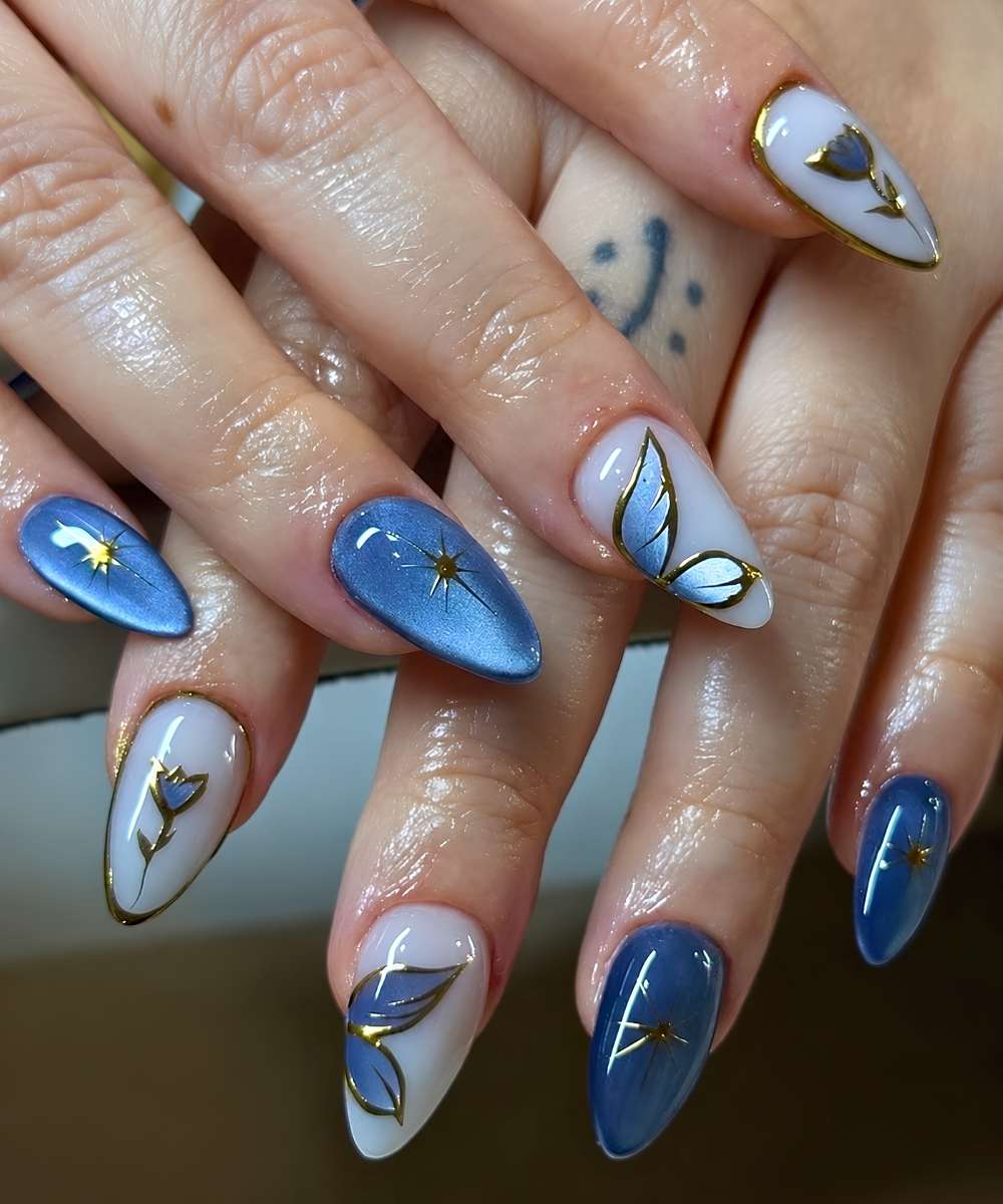 Blaue Cat Eye Naegel mit Blumen und Schmetterlingen