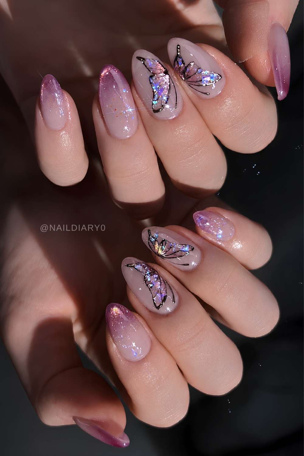 Rosa cat eye ombre naegel mit schmetterlingen