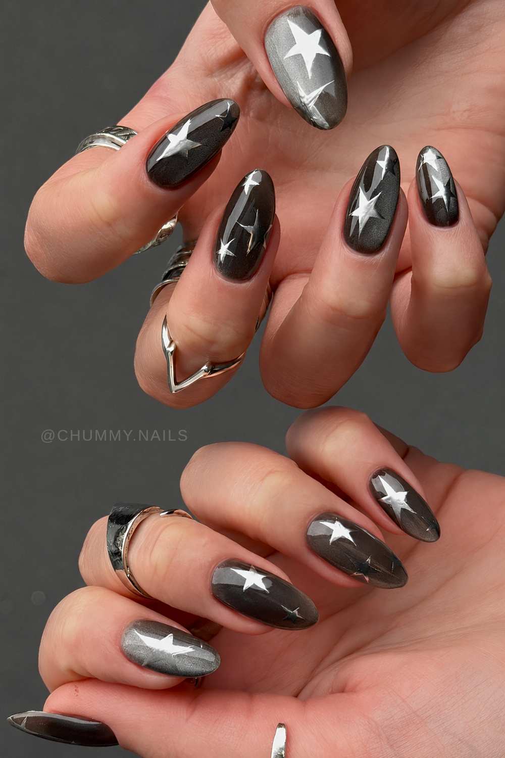 Schwarze Cat Eye Naegel mit silbernen Sternen