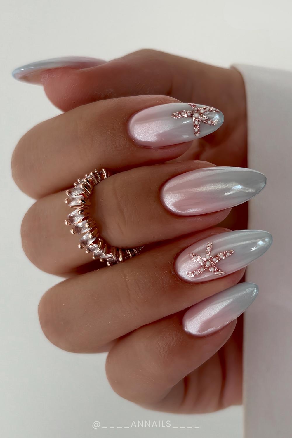Blaue Chrome Ombre Naegel mit Seestern Motiv