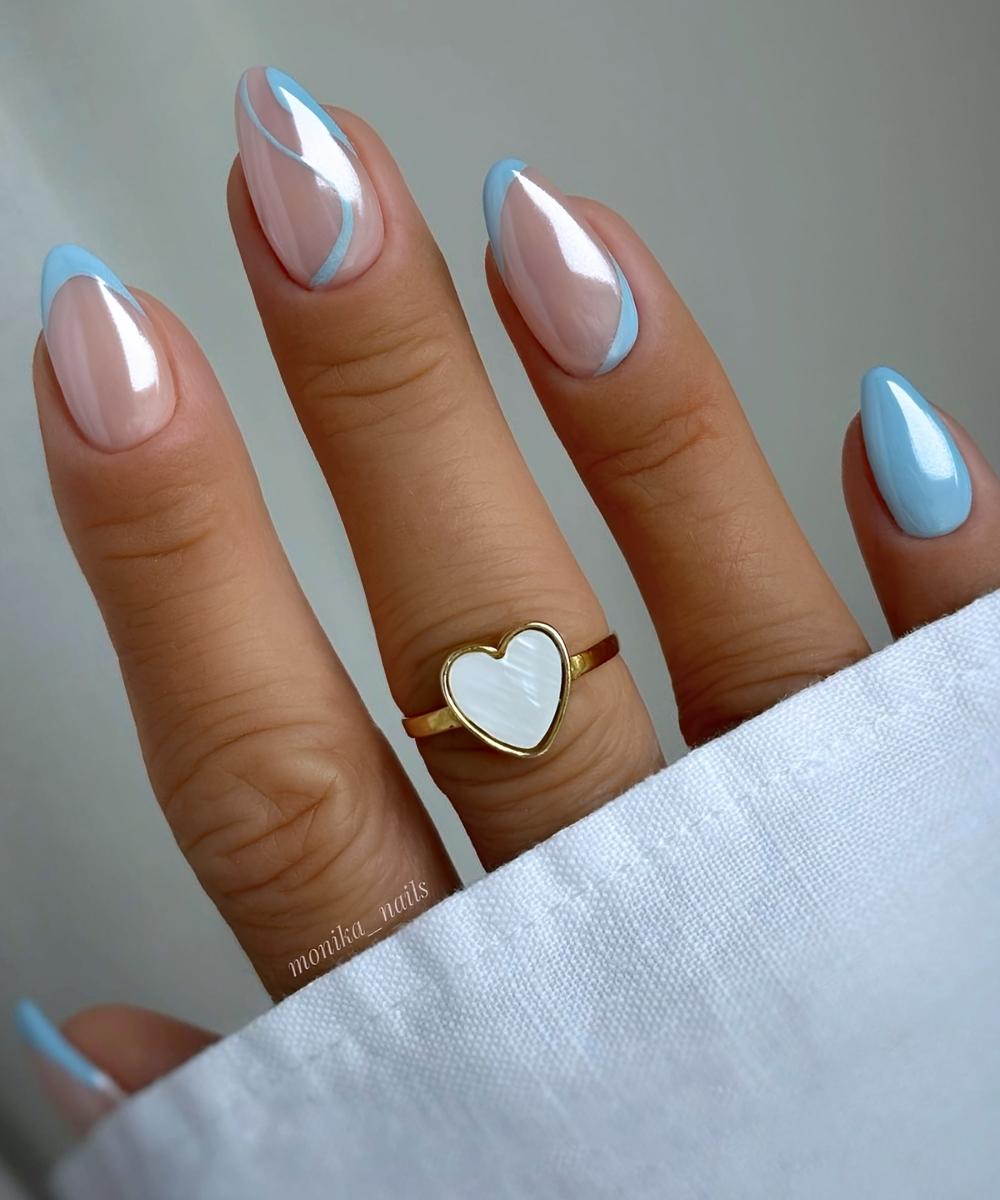 Blaue chrome naegel mit swirl design