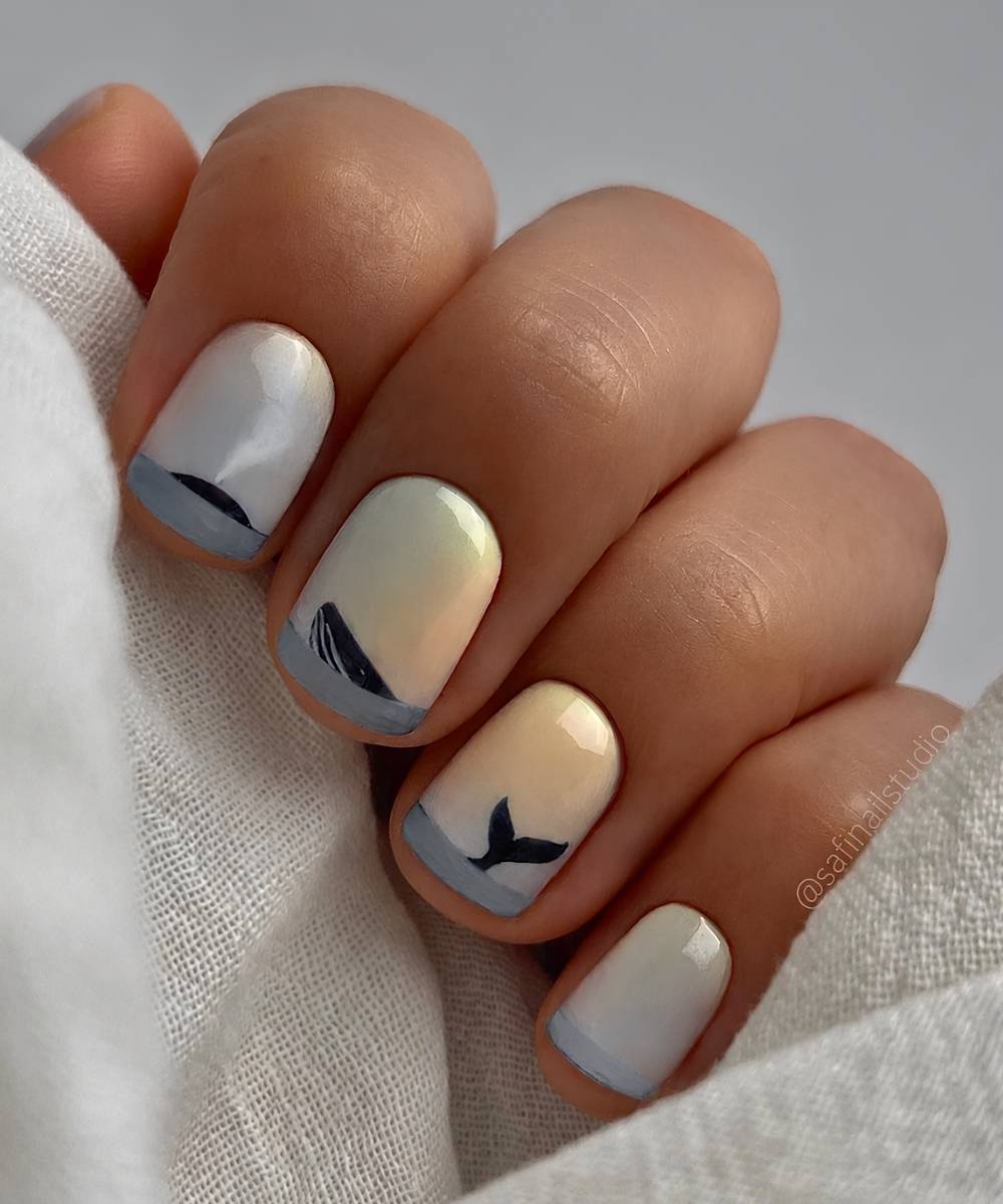 Blaue gelbe Naegel mit Wal Motiv