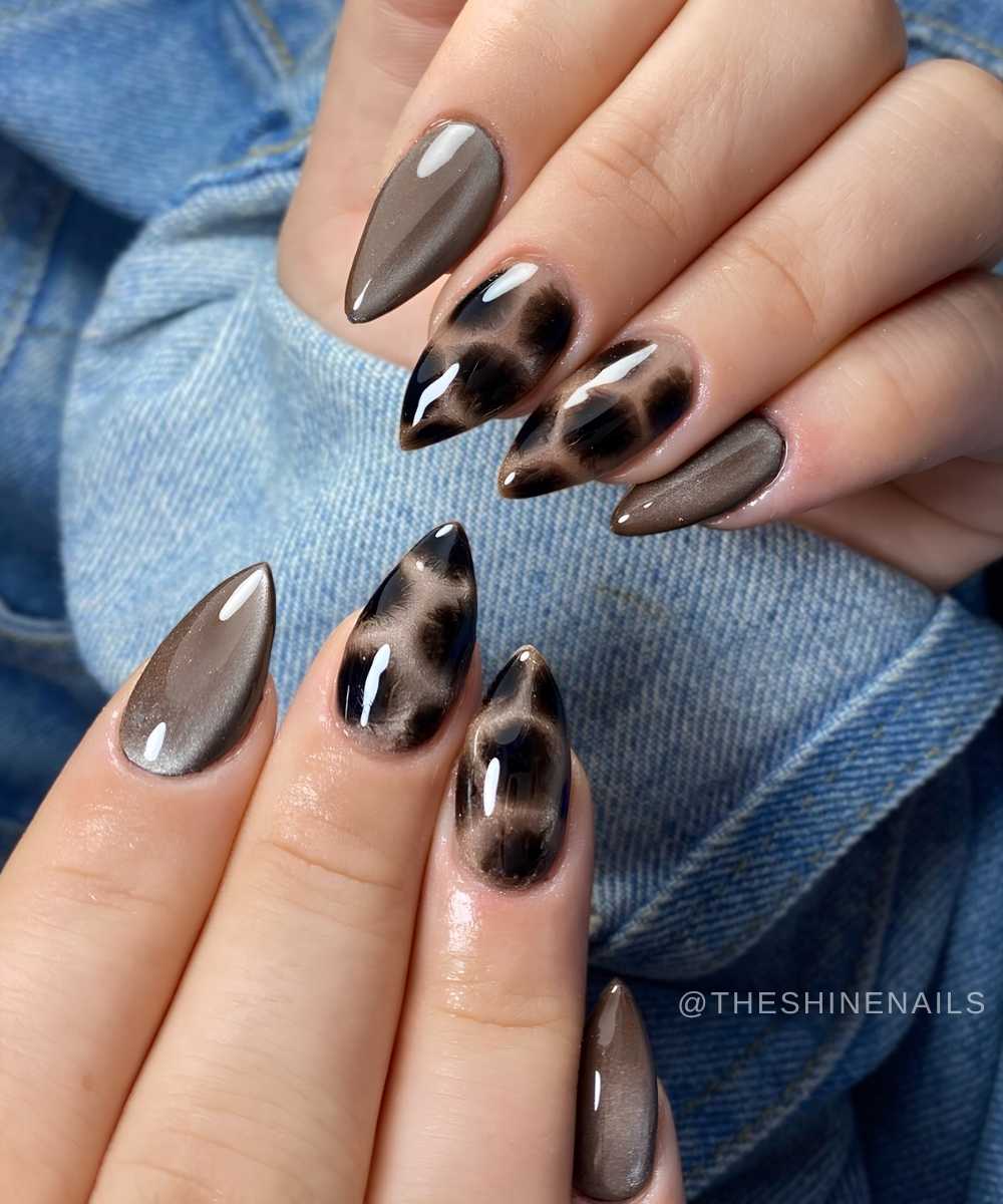 Graue cat eye naegel mit tiermuster akzent