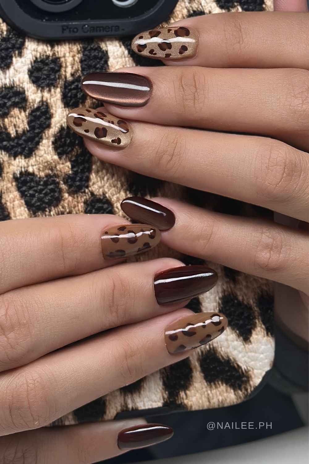 Taupe braune cat eye manikuere mit leopardenmuster