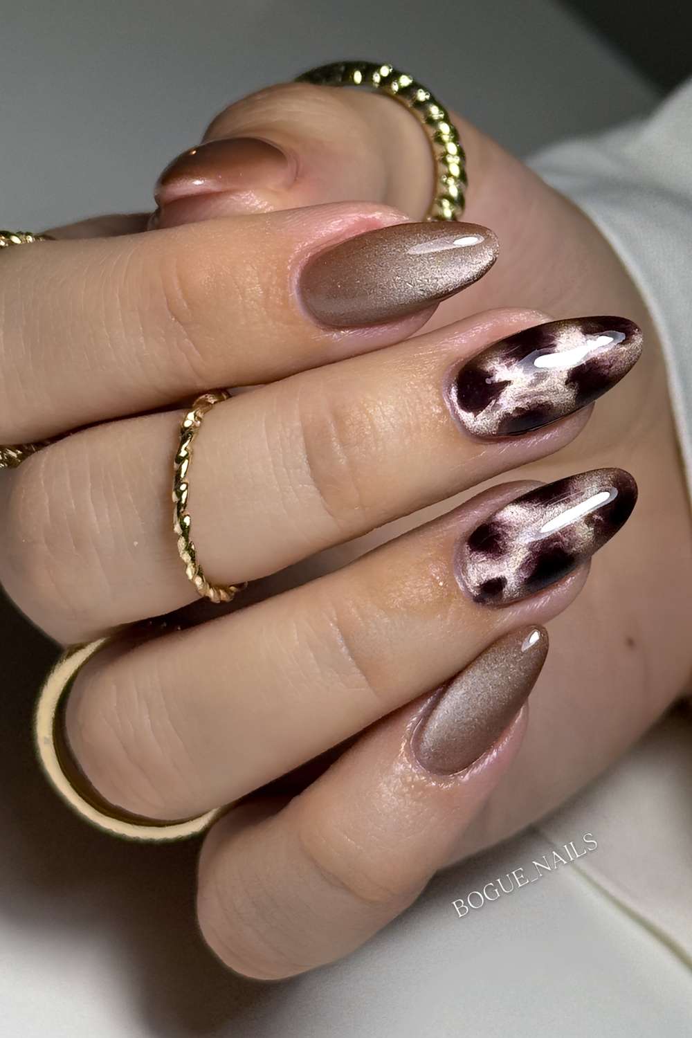 Taupe cat eye naegel mit tiermuster