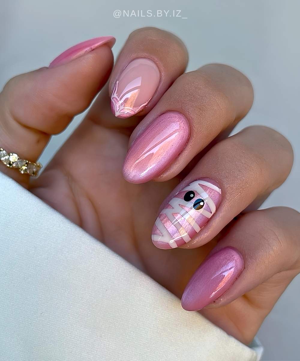 Rosa Cat Eye Naegel mit Mumienaugen