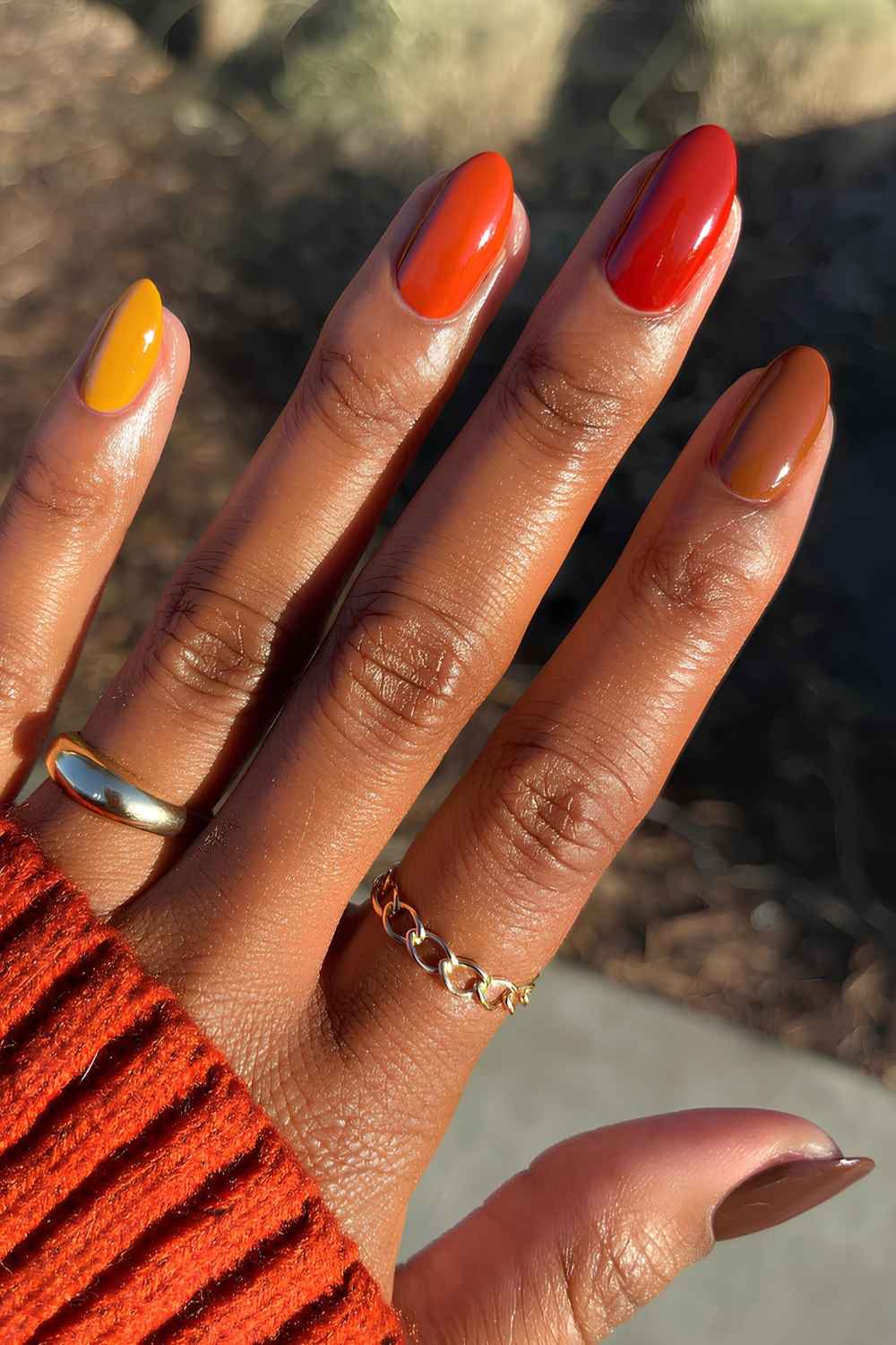 Skittle Manikuere in Orange und Braun